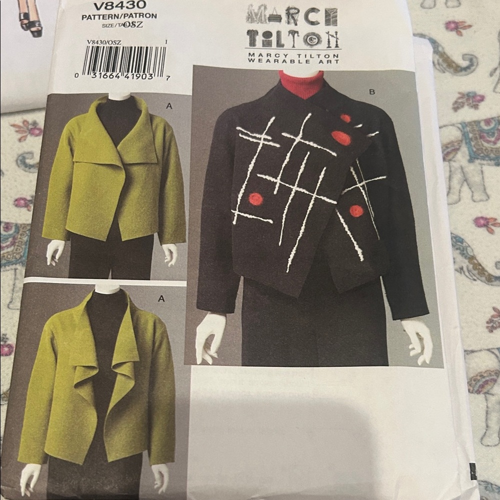 Vogue Fashion Patterns Collection with Red, Blue, and Gray Designs - Picture 6 of 7